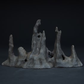 A Qing Dynasty imitation Lingbi stone purple sand pen frame mountain