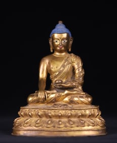 A seated statue of the Ming Dynasty copper gilt Medicine Buddha