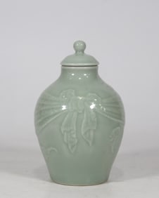 A bean blue glaze carved with a bat pattern jar made in the Qianlong period of the Qing Dynasty