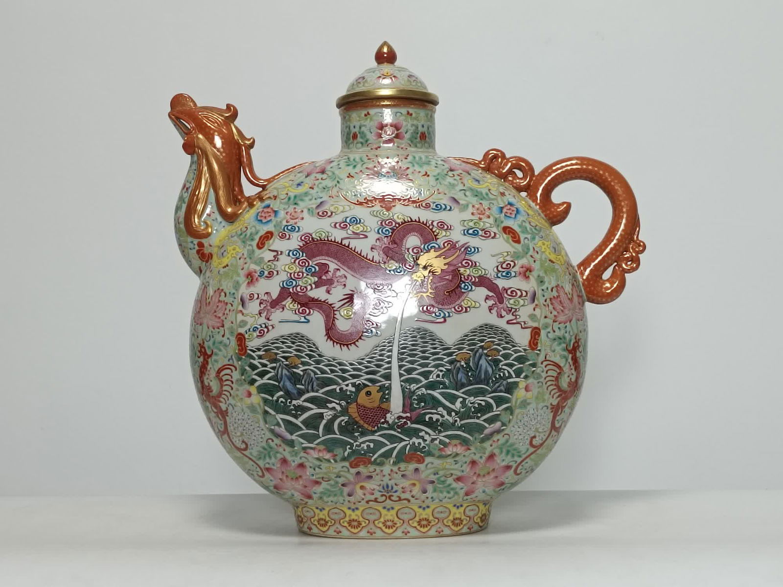 A Qing Yongzheng fish leap dragon gate crested pot: Qing Yongzheng enamel color jade green space Kui Feng wears intertwined branches open windows fish leaps dragon gate crested pot SIZE: H:50cm W:46cm T:20.5cm (The Dimensions Of All Batches Are Manuall