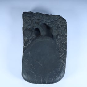 A Qing Dynasty Duanshi melon and cotton pattern inkstone