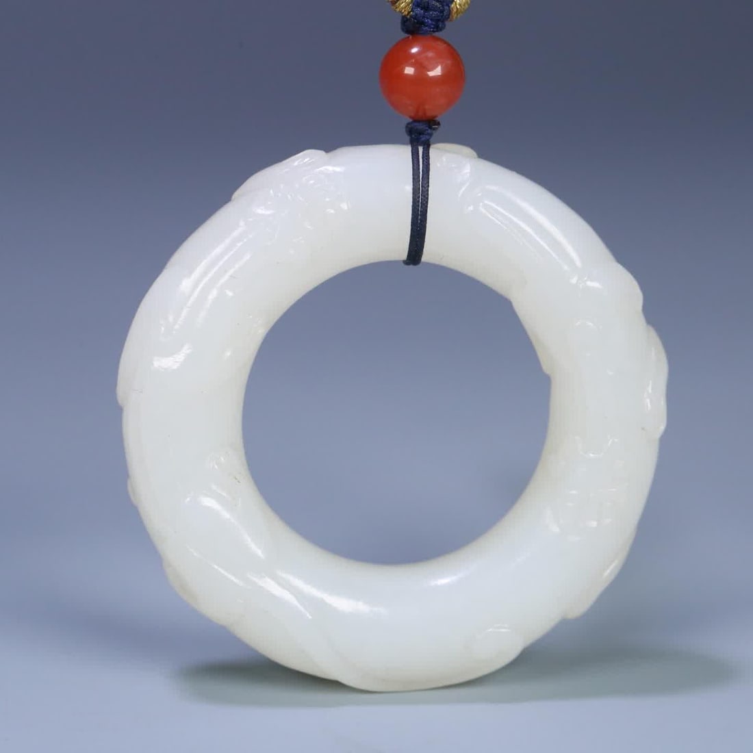 A Qing Dynasty Hetian jade dragon ring (1 of 9)