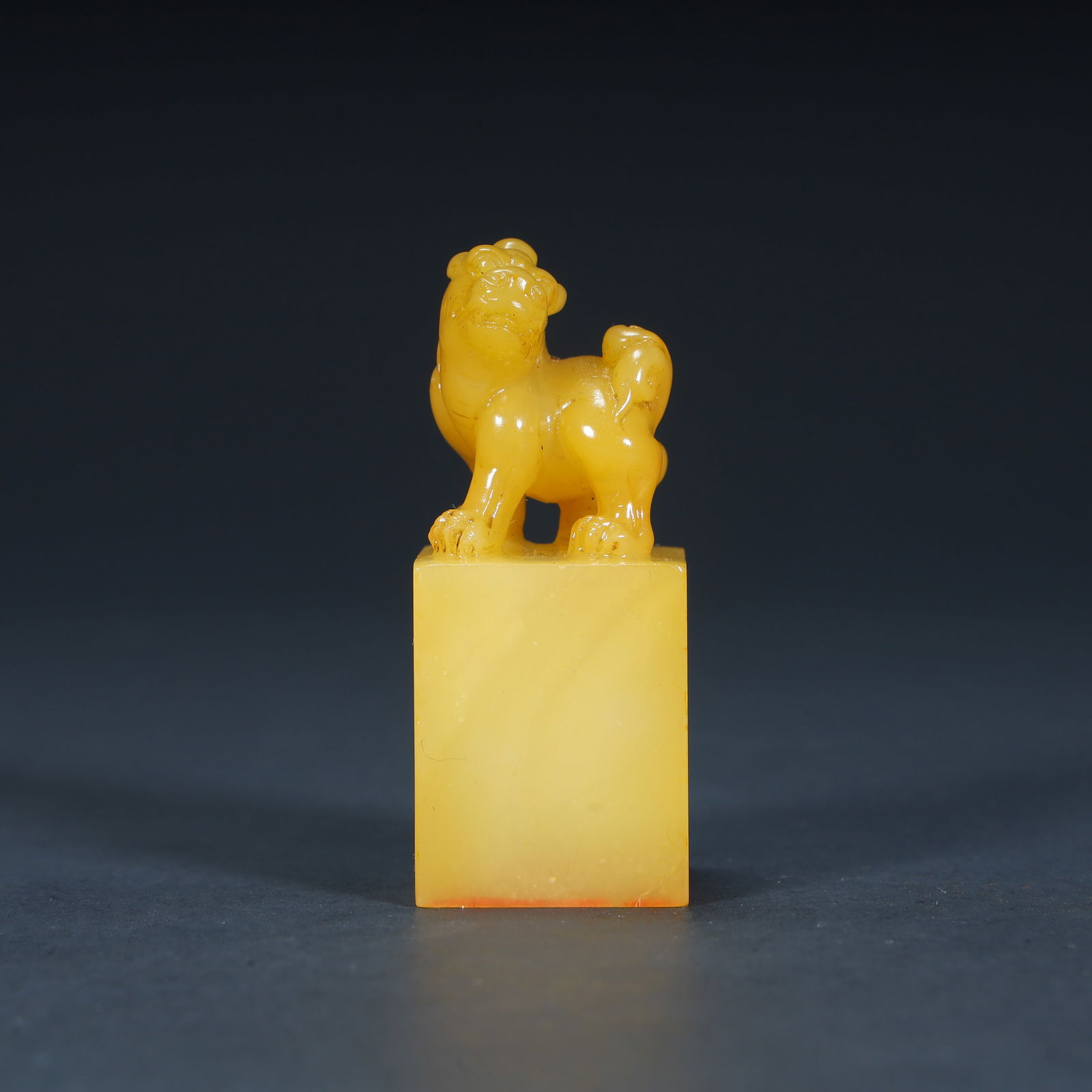 A Qing Dynasty Tian Huangshi "Auspicious Beast Button Seal (1 of 10)