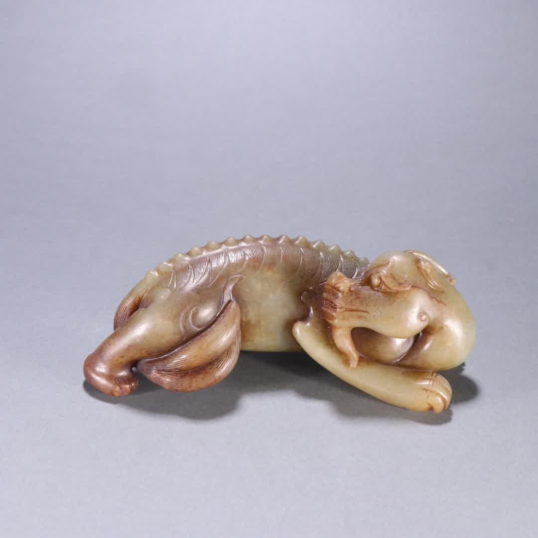 A Qing Dynasty Hetian jade beast ornament: Qing Dynasty Hetian jade auspicious beast ornament SIZE: H:5.4cm W:17cm W:765g (The Dimensions Of All Batches Are Manually Measured.If You Need More Detailed Information, Please Contact Our