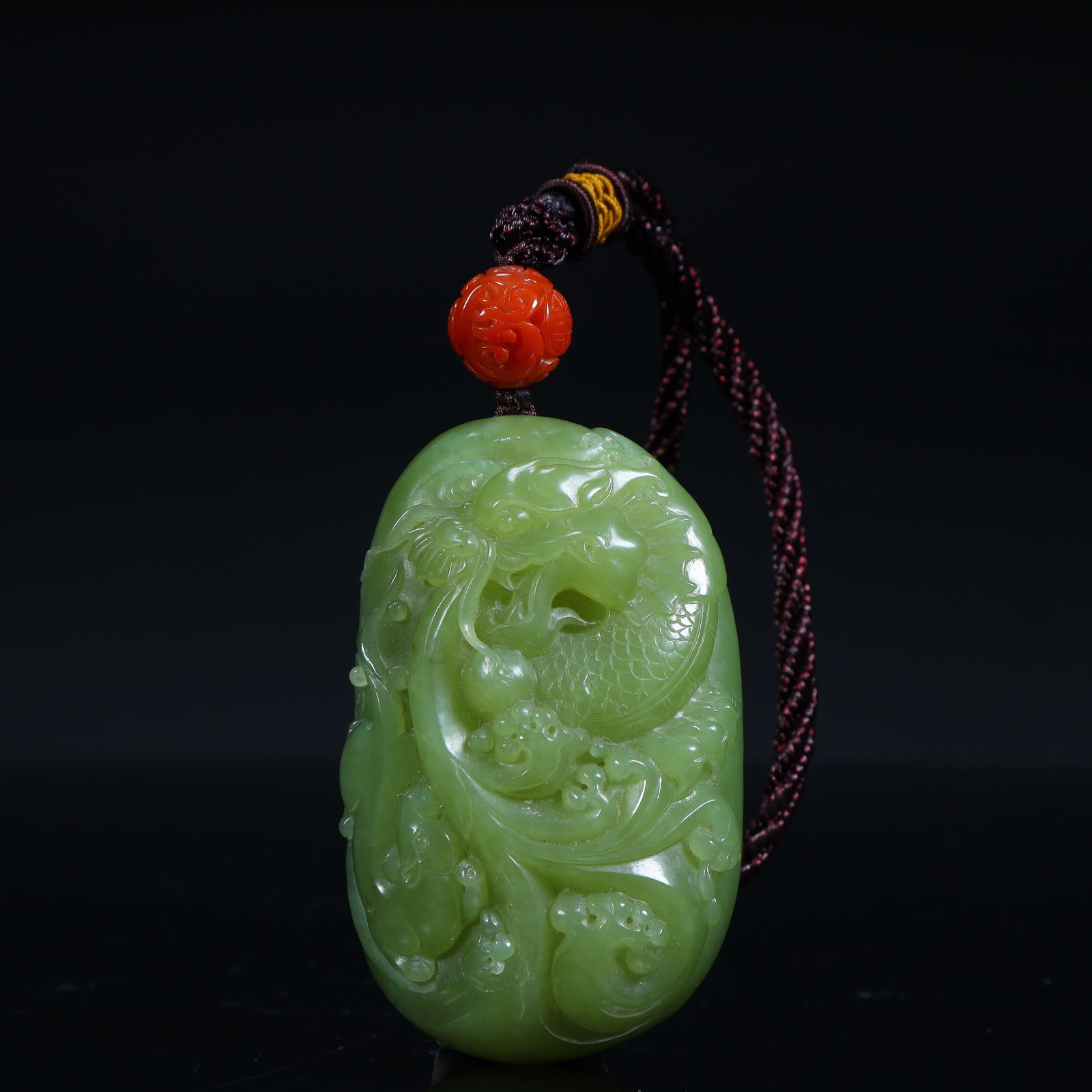 A Qing Dynasty jasper cloud dragon pattern handle (1 of 10)