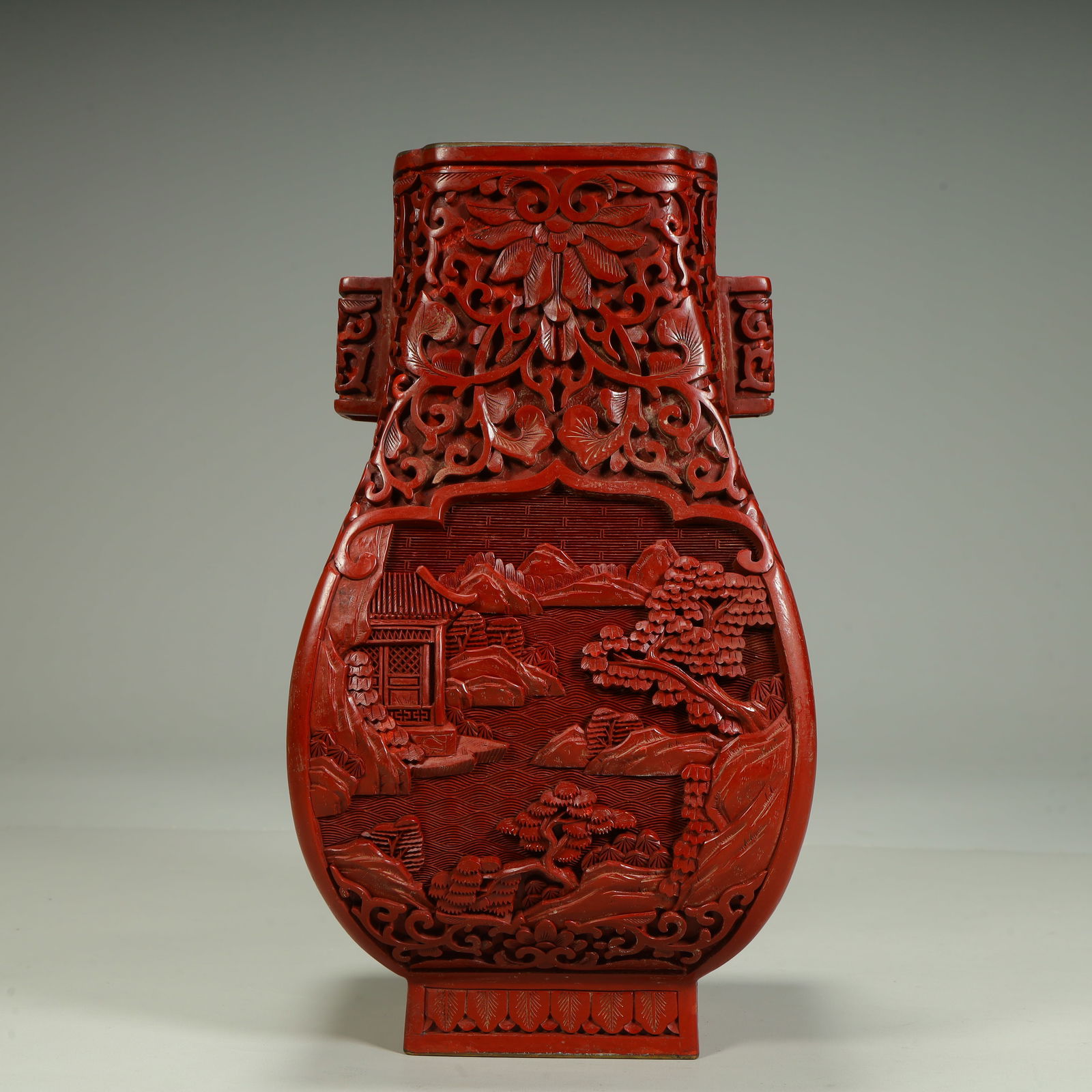 A Qing Dynasty double-horned flat bottle with red landscape pavilion pattern (1 of 11)