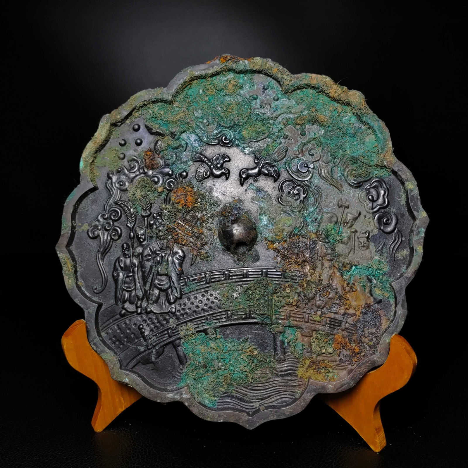 A bronze black lacquer ancient figure mirror (1 of 9)