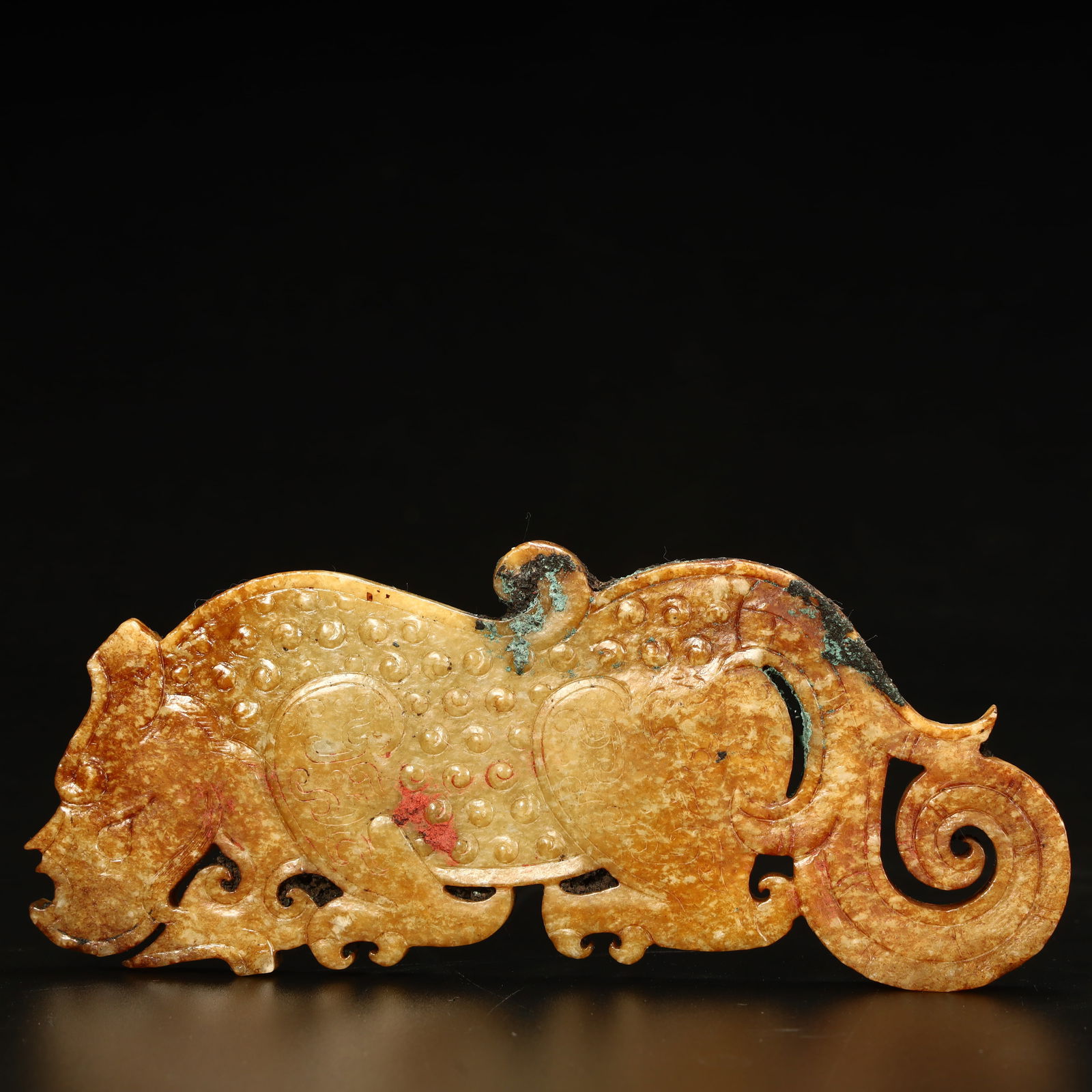 A grain-patterned jade tiger-shaped pendant (1 of 10)