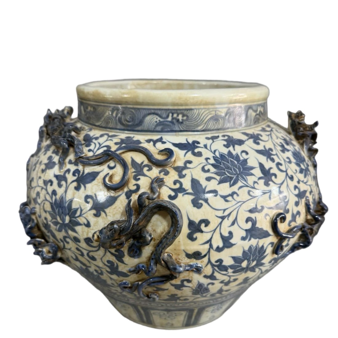 A Yuan blue and white pile carved dragon jar: Yuan Qinghua pile carved dragon jar SIZE: H:28cm W:35cm (The Dimensions Of All Batches Are Manually Measured.If You Need More Detailed Information, Please Contact Our Customer Service Before Bidding.)