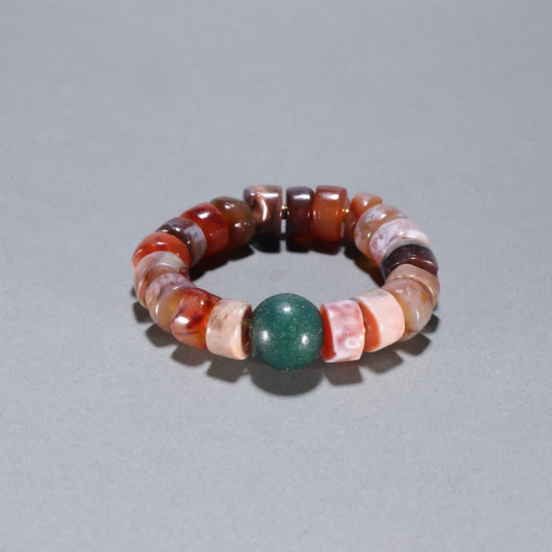 A Qing Dynasty sugar ball agate bracelet (1 of 9)