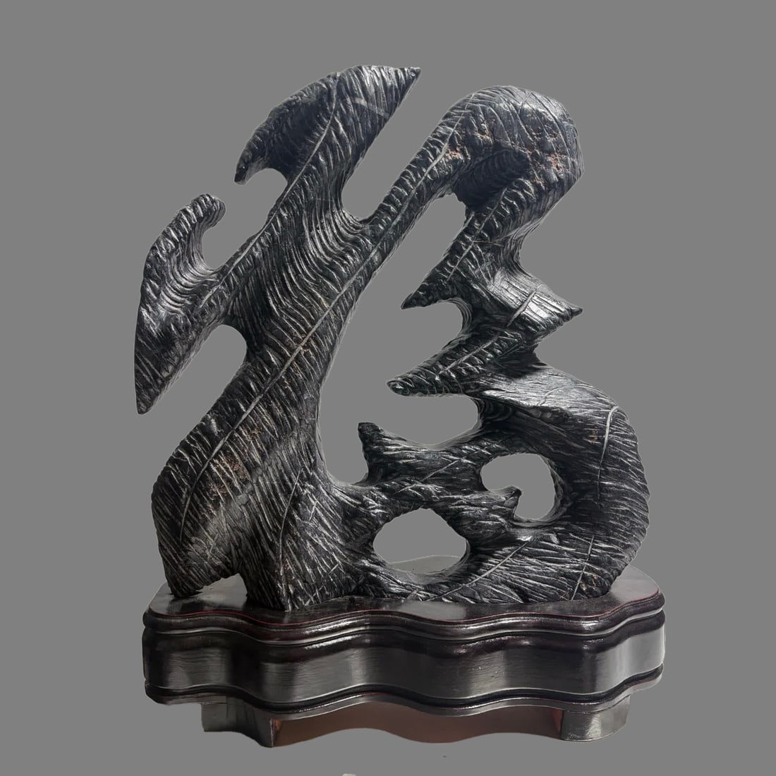 A Qing Dynasty Lingbi stone ornament ""Fu" to wealth and prosperity (1 of 8)