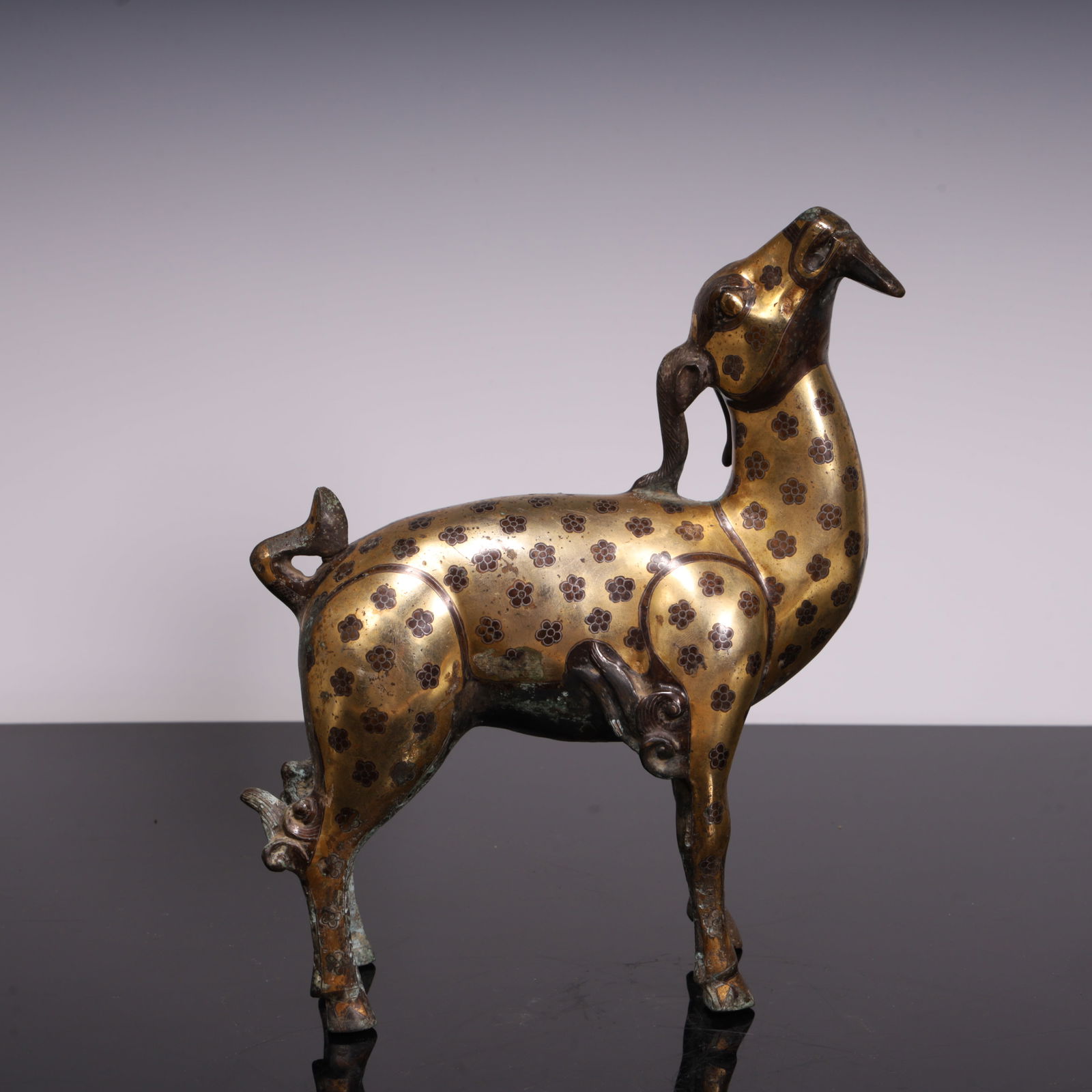 A Han copper carved gold and silver sheep (1 of 9)