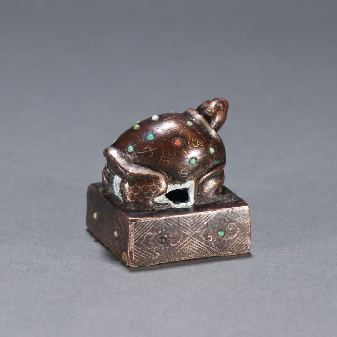 A Han Dynasty copper gold and silver turtle button seal (1 of 9)