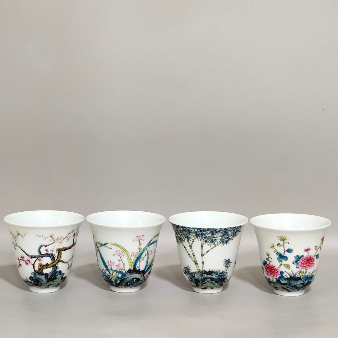 A poem cup inscribed on the Qing Dynasty Yongzheng Four Seasons Flower "Mei Lan Bamboo (1 of 9)