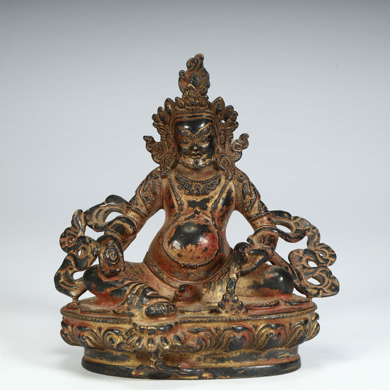 A statue of the Tibetan Buddhist bronze black God of Wealth (1 of 10)