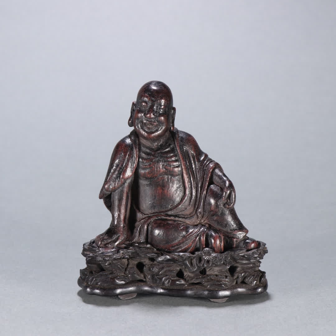 A Qing Dynasty agarwood Luohan Dynasty statue: Qing Dynasty Agarwood Arhat Dynasty statue SIZE: H:10cm W:9.3cm W:62.7g (The Dimensions Of All Batches Are Manually Measured.If You Need More Detailed Information, Please Contact Our Customer