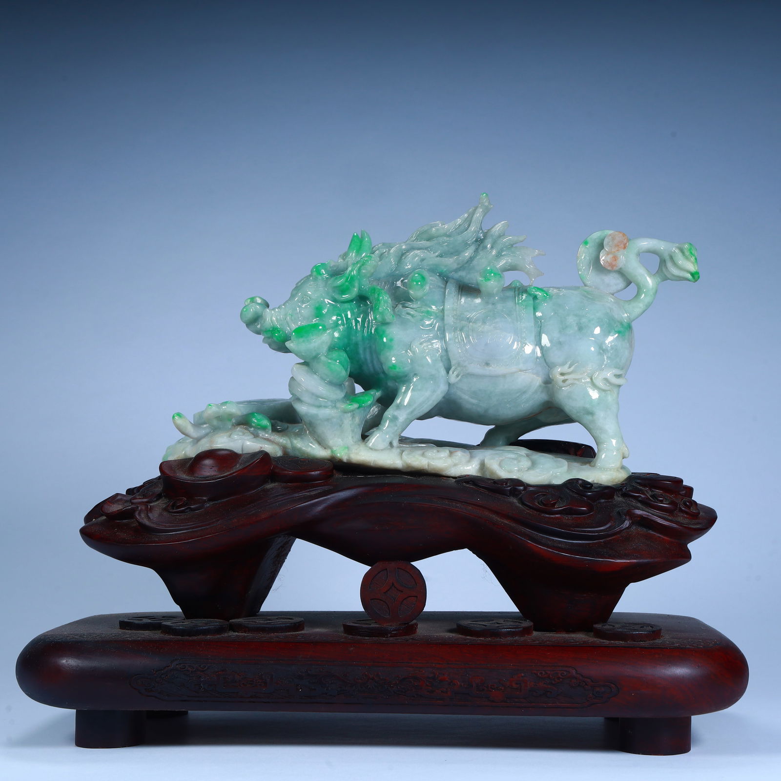 A Qing Dynasty jade "bullish" ornament (with mahogany base): Qing Dynasty jade "bullish" ornament (with mahogany base) SIZE: 27?H:14cm L:25cm W:10cm W:2.6kg (The Dimensions Of All Batches Are Manually Measured.If You Need More Detailed Information, Please Conta
