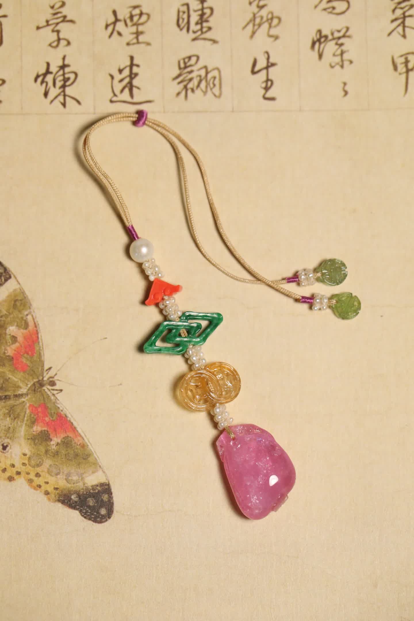 A Qing Dynasty tourmaline pendant carving (1 of 7)