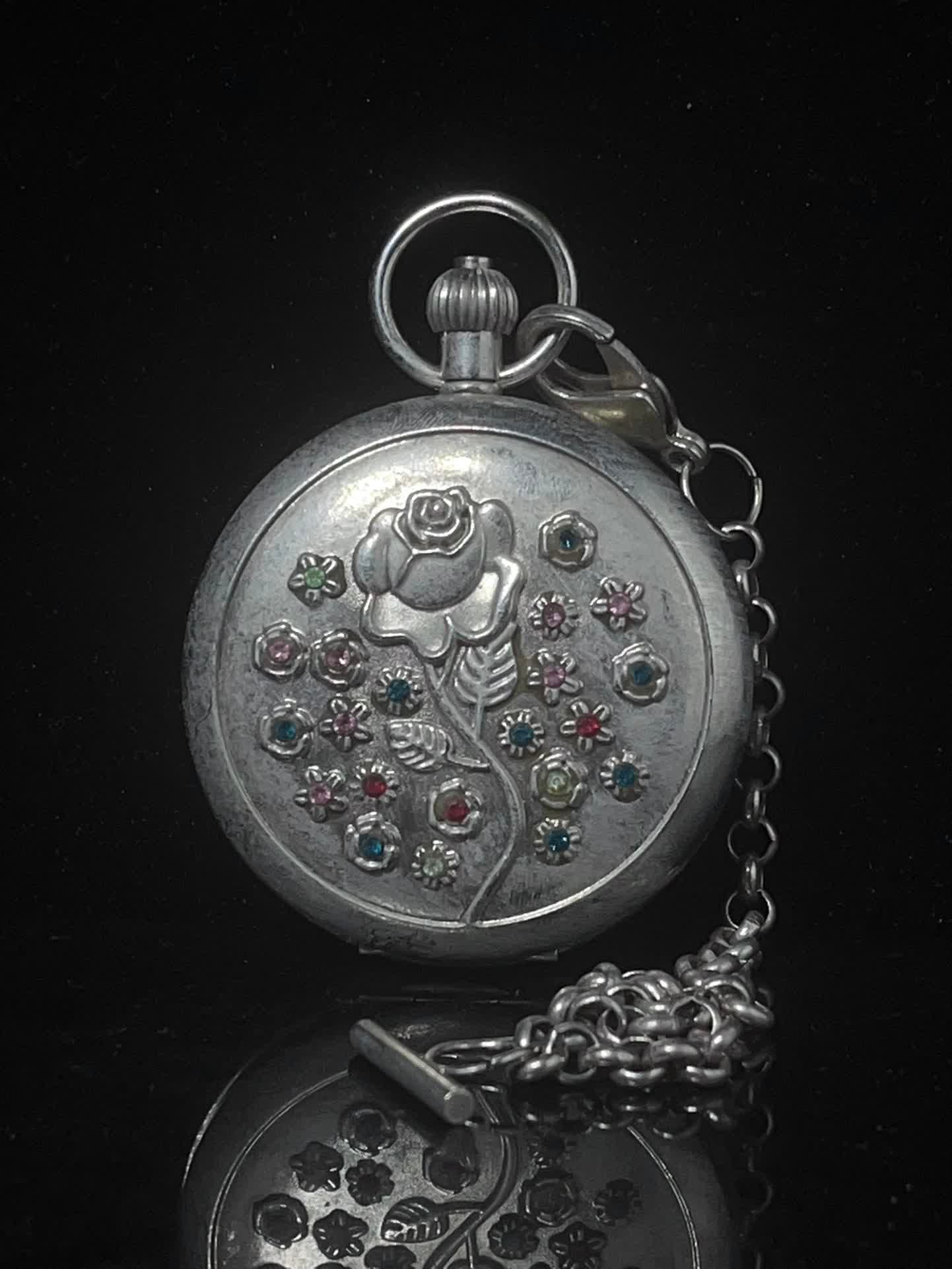 A double-open pocket watch of the sun, moon and stars (1 of 6)