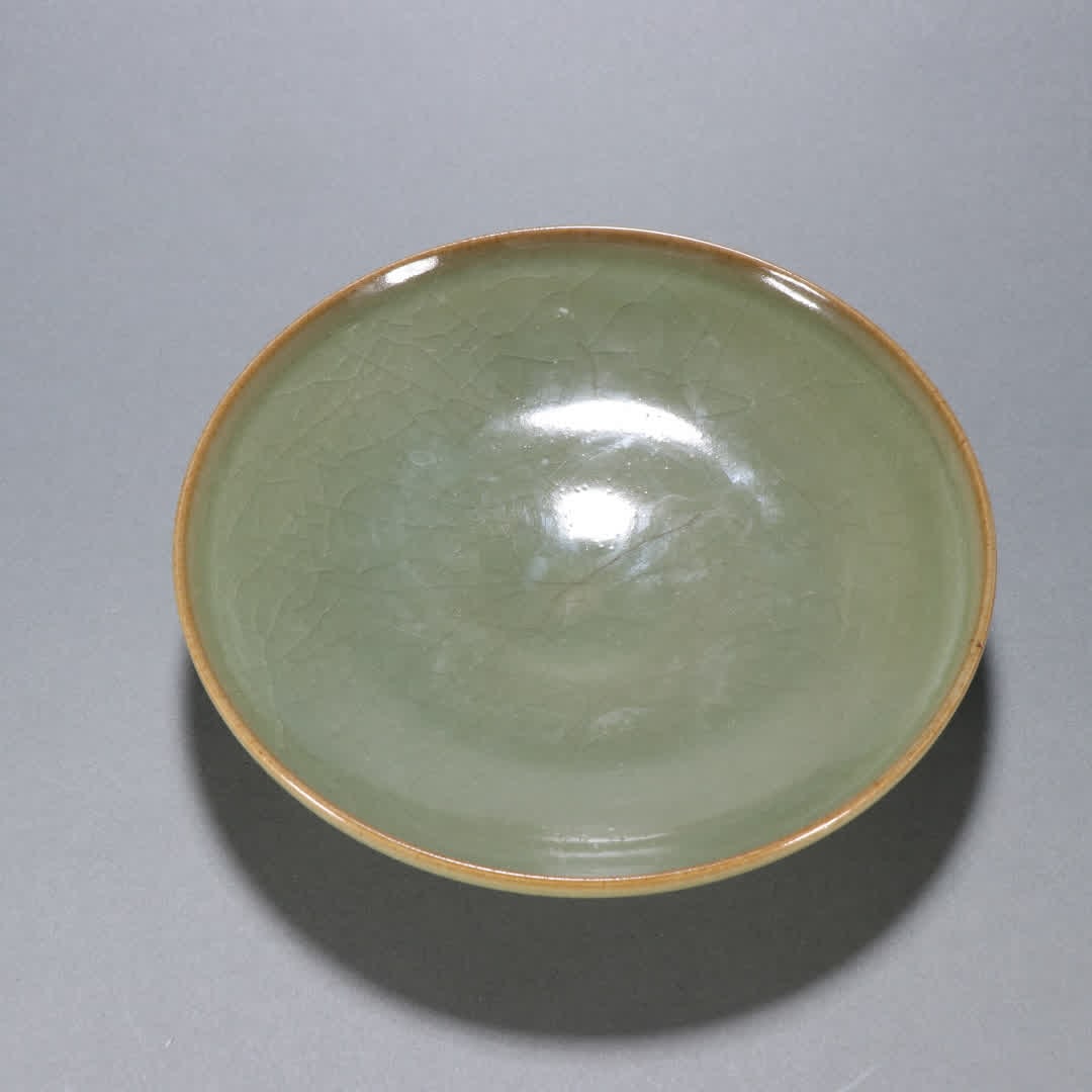 A Song Dynasty celadon gold-clad plate (1 of 9)