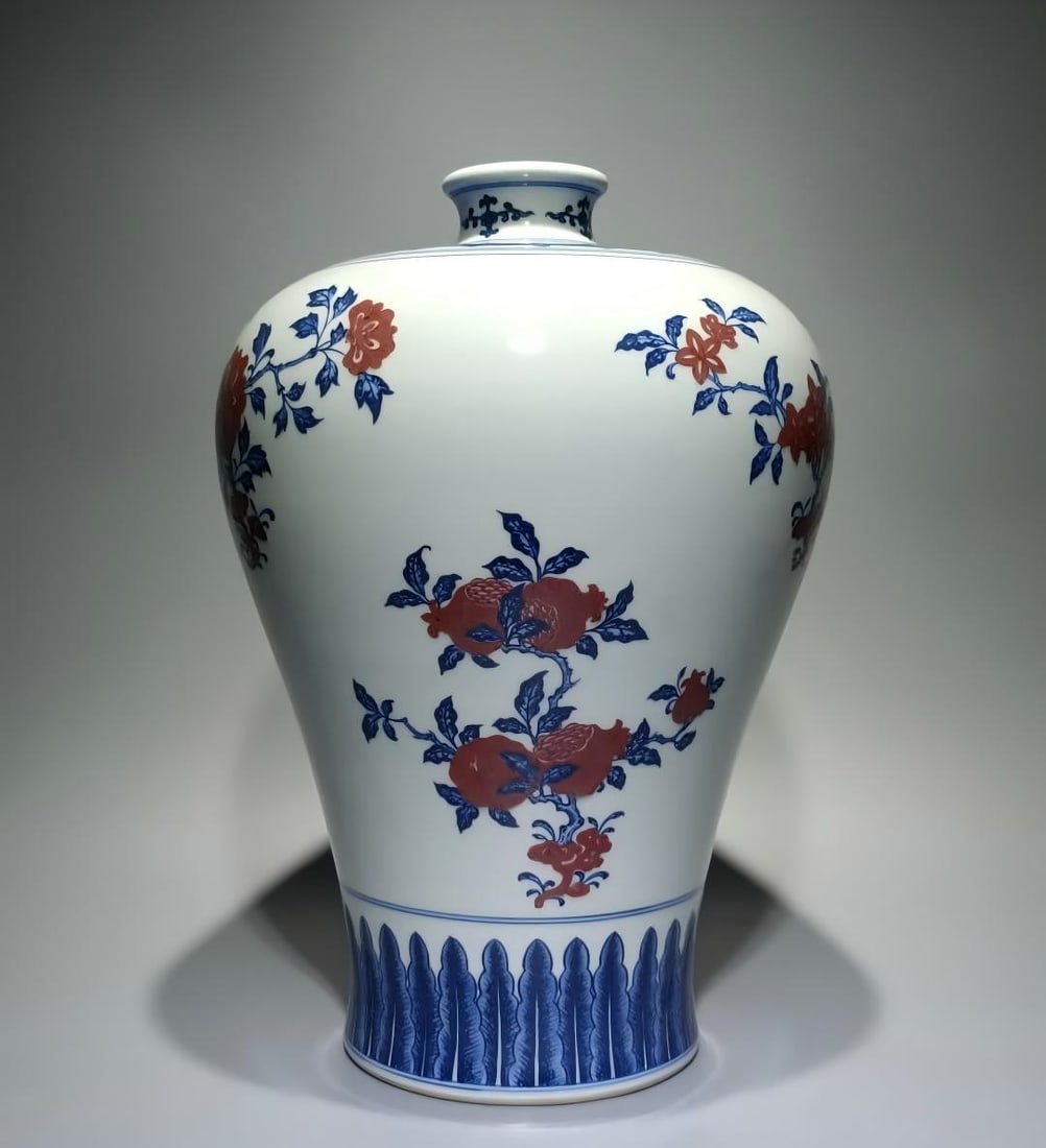 A Qing Qianlong blue and white glazed red three-fruit three-pattern plum bottle (1 of 9)