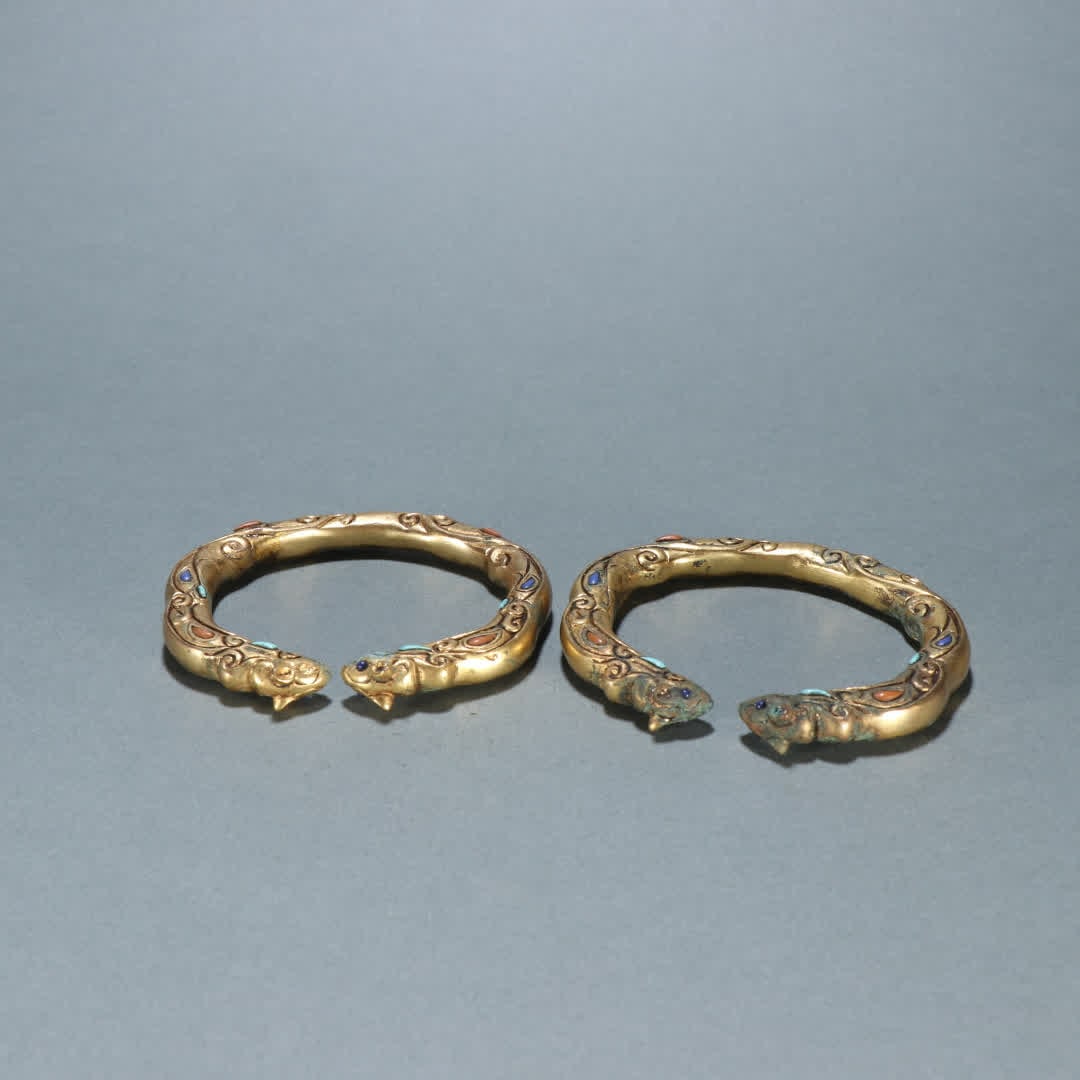 A pair of Qing Dynasty copper gilt inlaid treasure bracelets (1 of 9)