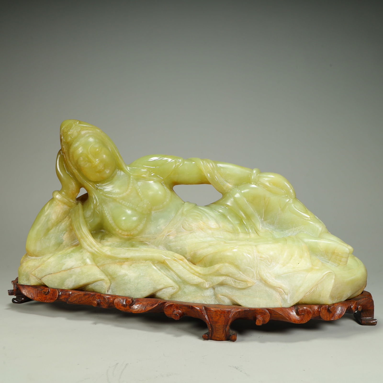 A statue of Guanyin in a reclining position (1 of 13)