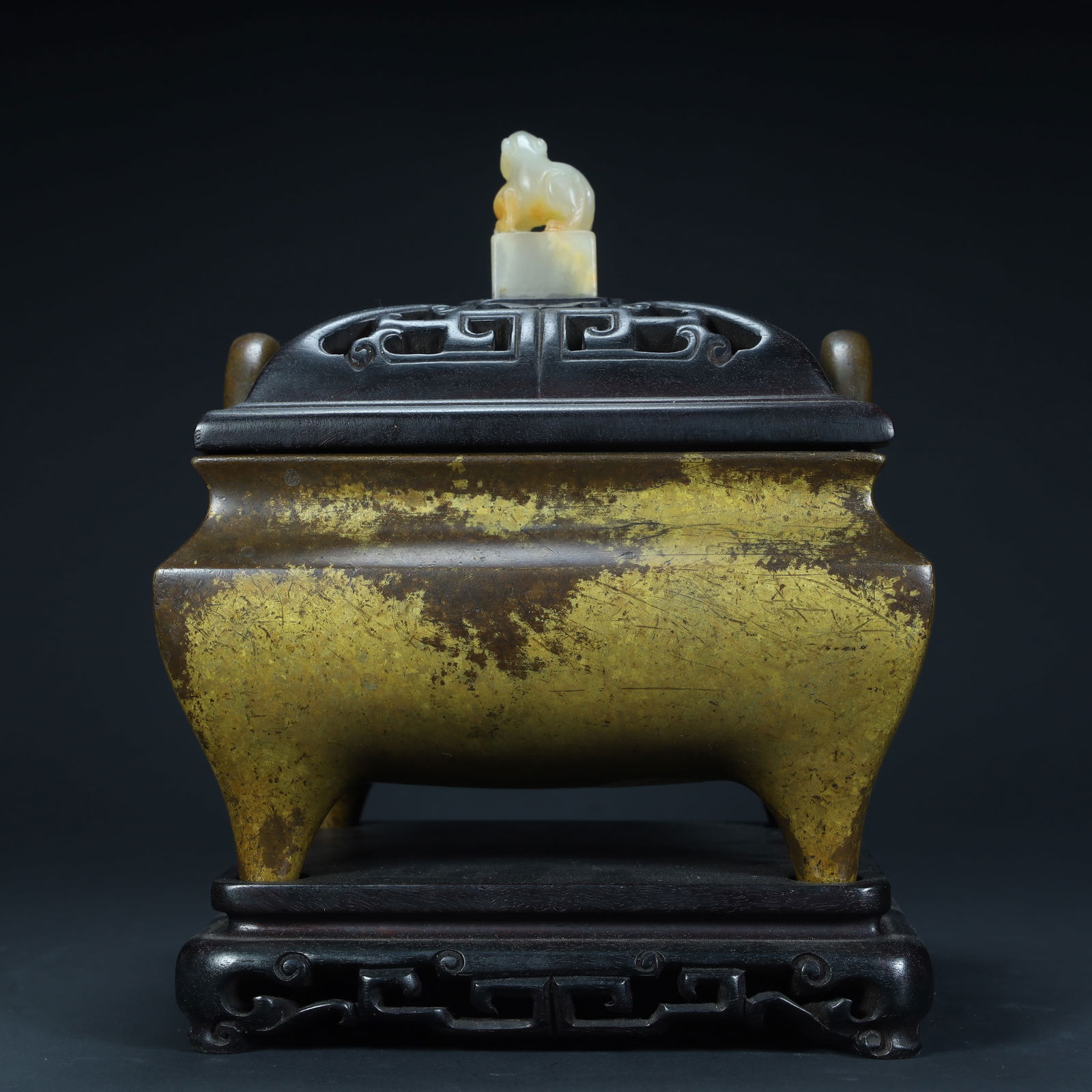 A Qing Dynasty copper sprinkled with gold square three-legged aromatherapy stove (1 of 13)