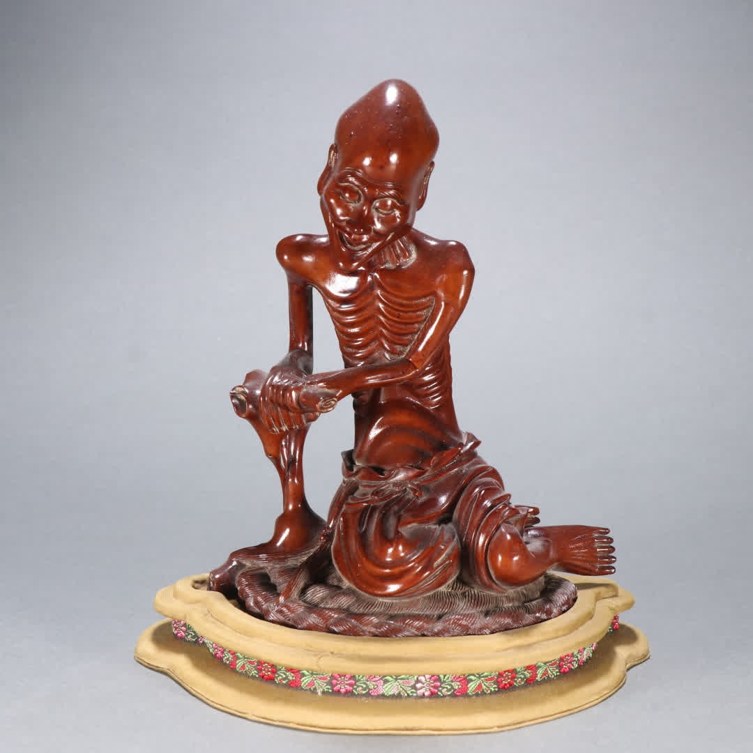 A statue of a skinny Arhat in boxwood in the Qing Dynasty (1 of 9)