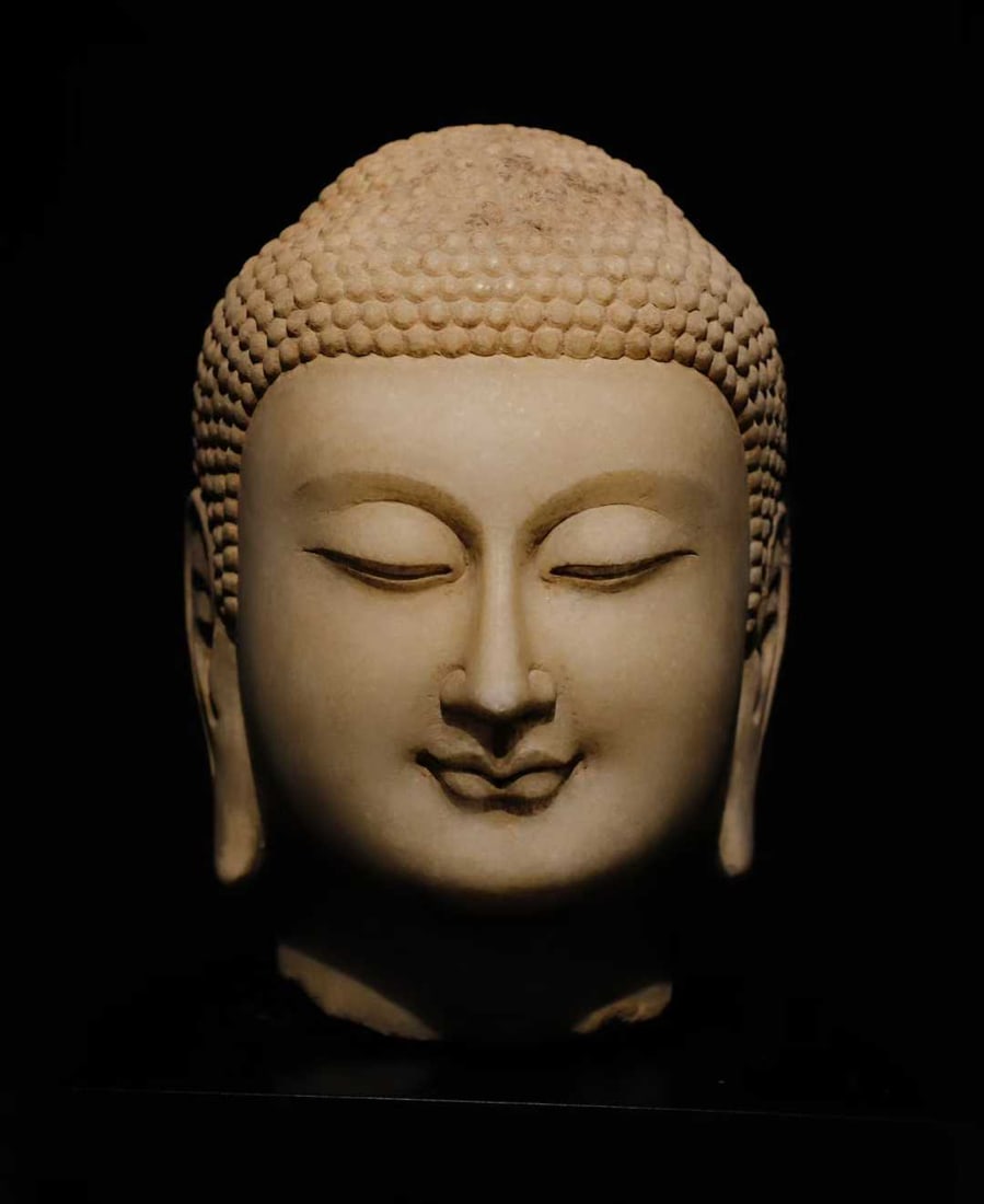A white jade Buddha head of the Northern Qi Dynasty (1 of 8)