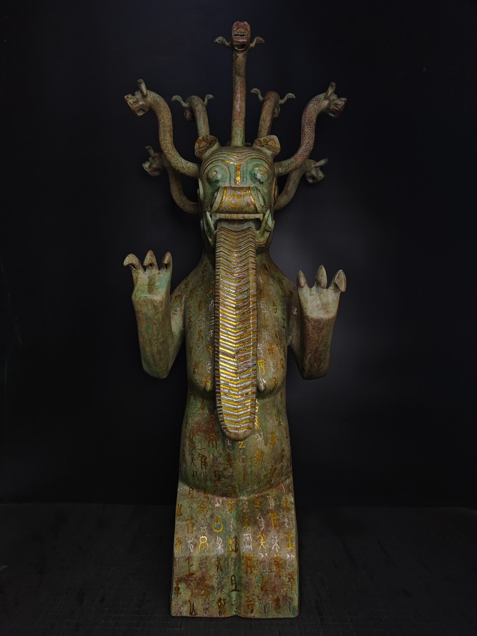 A Warring States Bronze - Cuo Jin Cuo Silver Nine-Headed Beast: Warring States Bronze - Cuo Jin Cuo Silver Nine SIZE: H:102cm W:45cm W:21.4kg (The Dimensions Of All Batches Are Manually Measured.If You Need More Detailed Information, Please Contact Our Customer Se