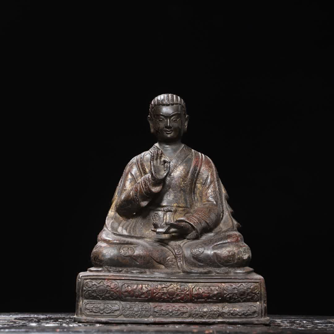 A bronze statue of the Guru Buddha (1 of 9)