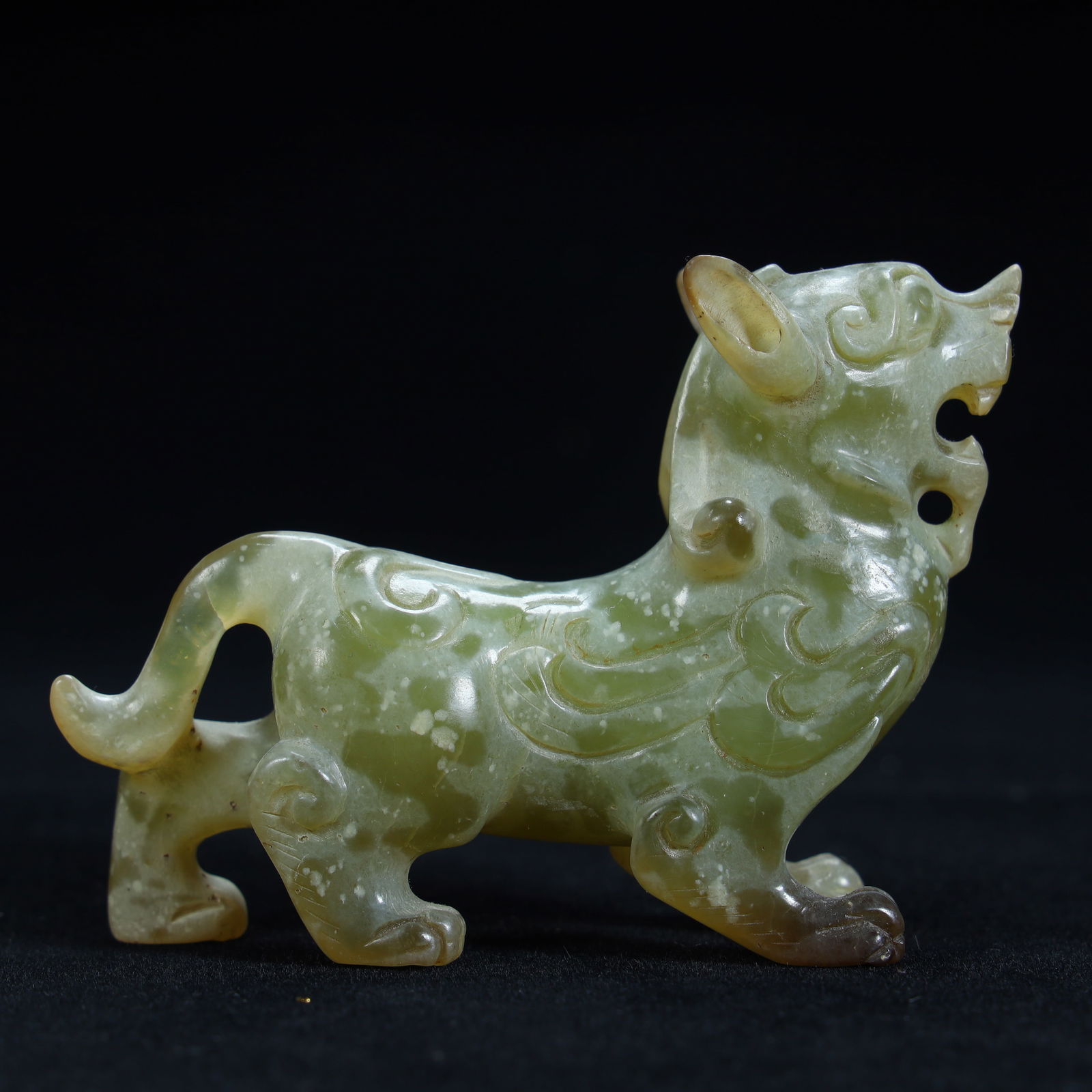 A Han Dynasty green jade ornament to ward off evil beasts (1 of 10)