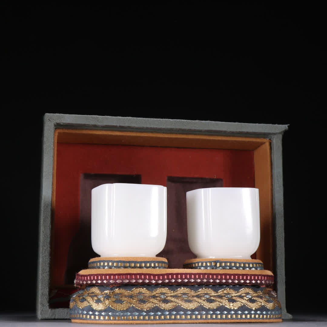 A pair of Qing Dynasty Hetian jade cups (1 of 9)