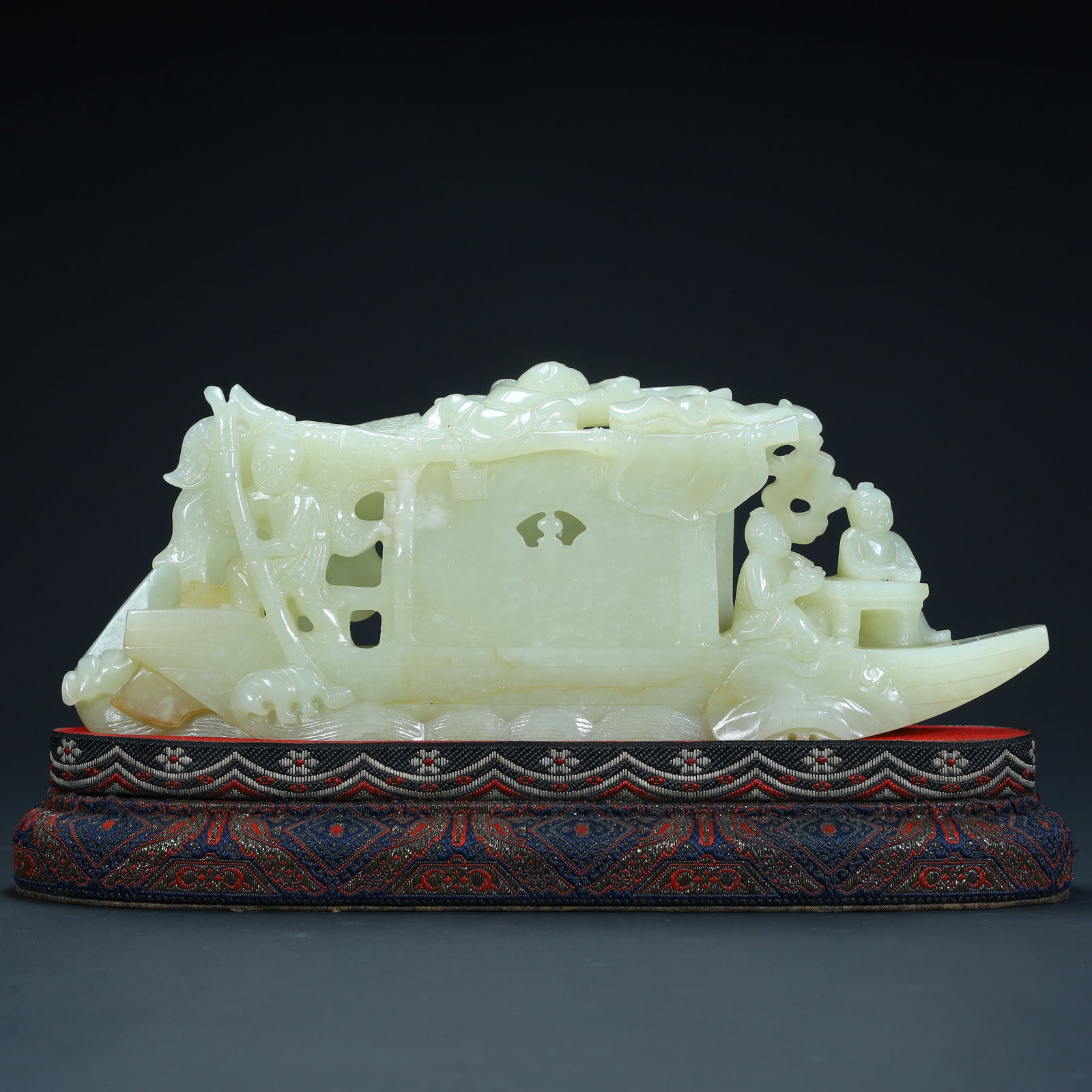 A Qing Dynasty Hetian jade "literati boating" pattern ornament: Qing Dynasty Hetian jade "literati boating" pattern ornament SIZE: H:9.5cm L:23cm W:5cm W:882g (The Dimensions Of All Batches Are Manually Measured.If You Need More Detailed Information, Please Contac