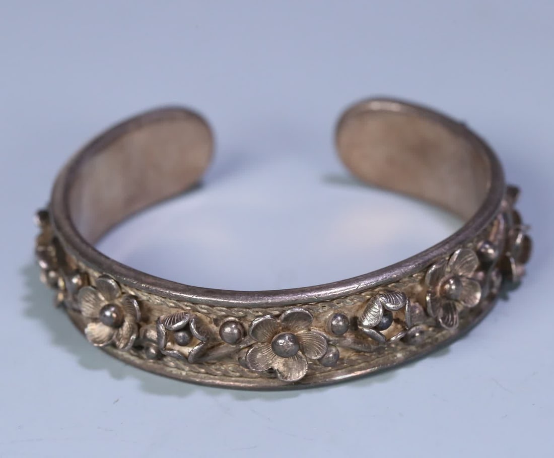 A Qing Dynasty plum pattern old silver bracelet (1 of 9)