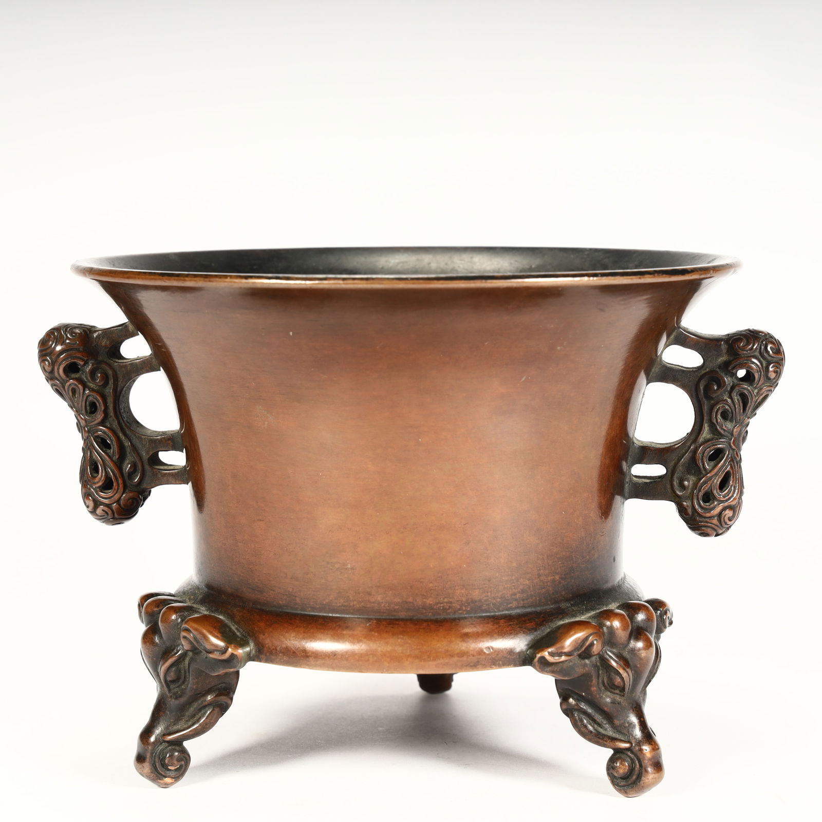 A Qing Dynasty copper hollow beast ear auspicious beast three-legged incense burner (1 of 9)