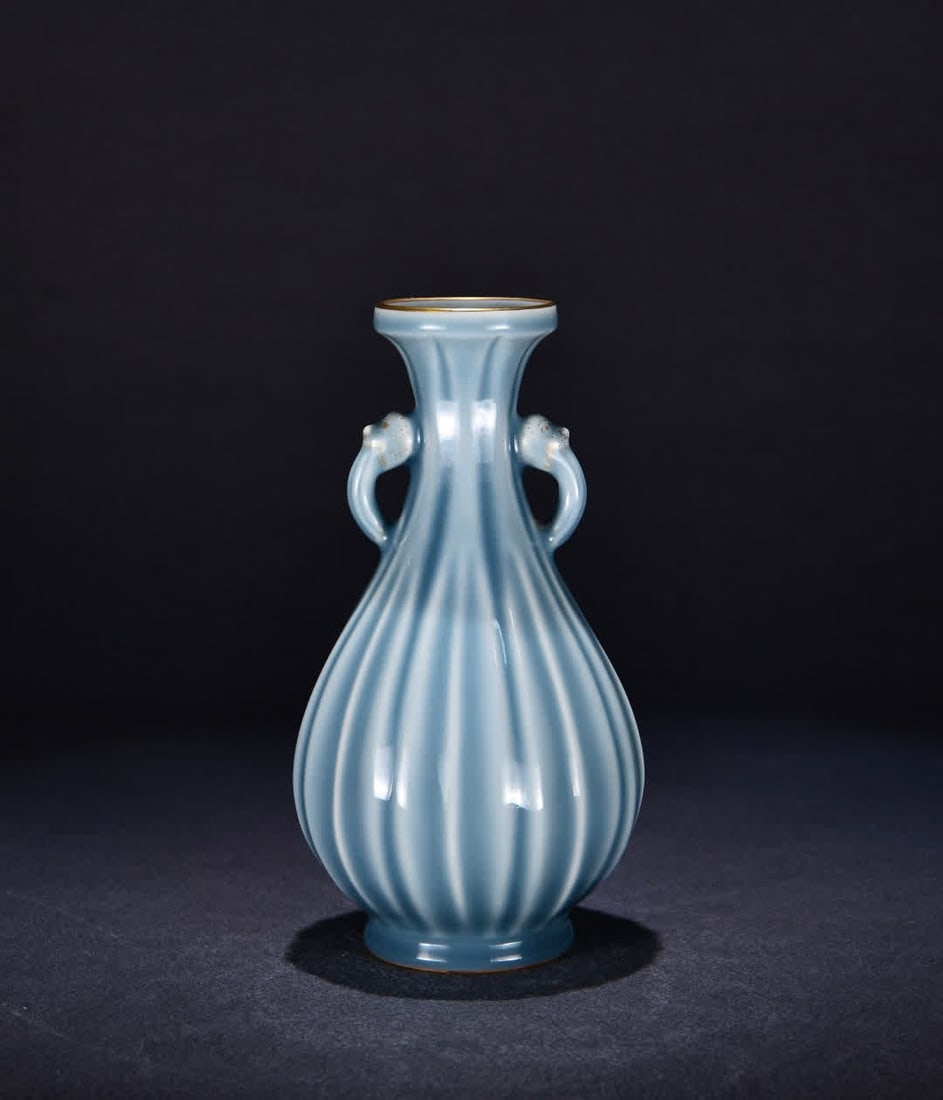 A Qing Qianlong sky blue glazed melon edge elephant ear bottle (1 of 9)