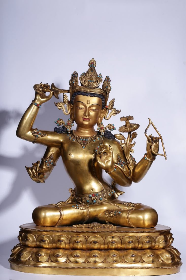 A Qing Dynasty copper gilt inlaid treasure four-wall statue of Manjushri Bodhisattva: Qing Dynasty copper gilt inlaid treasure four walls Manjushri Bodhisattva statue SIZE: H:61.5cm L:50cm W:37cm W:22.5kg (The Dimensions Of All Batches Are Manually Measured.If You Need More Detailed