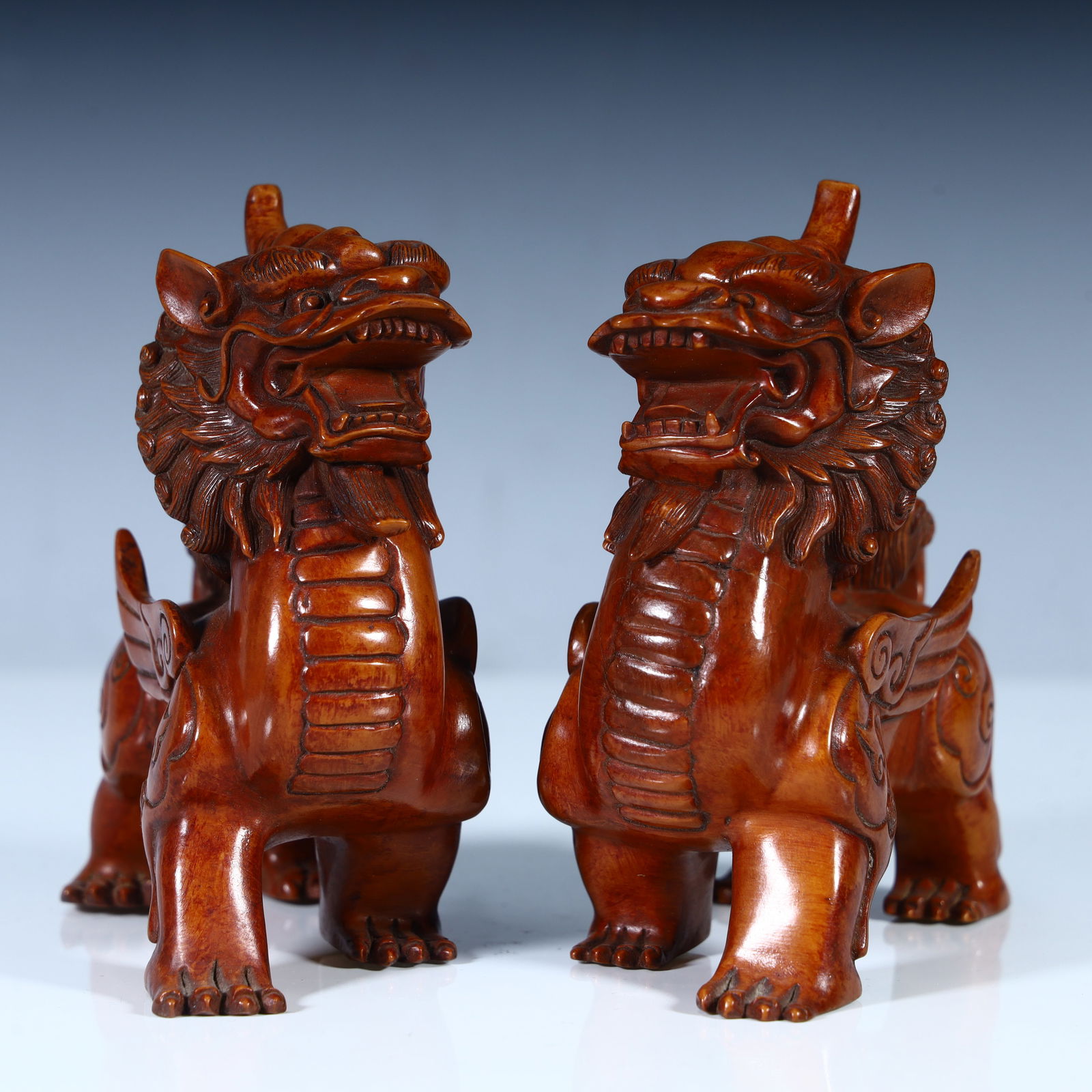 A pair of Qing Dynasty high-quality boxwood carvings Pixiu: Qing Dynasty high-quality boxwood carving Pixiu SIZE: H: 11cm L: 11cm W: 5cm Total W: 316g (The Dimensions Of All Batches Are Manually Measured.If You Need More Detailed Information, Please Contact Ou