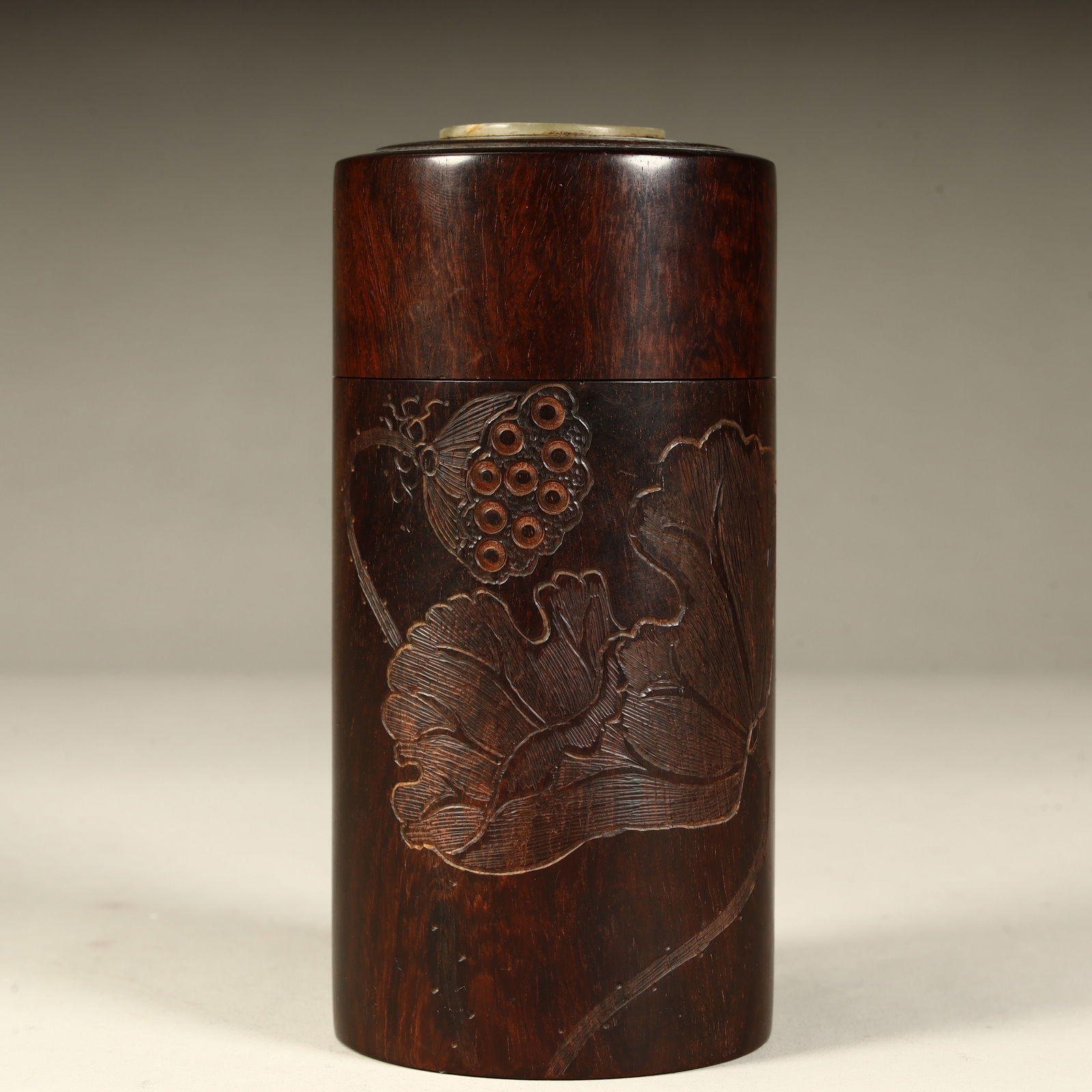 A Qing Dynasty mahogany wood carved lotus pattern tea jar: Qing Dynasty mahogany wood carved lotus pattern tea cans SIZE: H:12.5cm L:6cm W:6cm W:235g (The Dimensions Of All Batches Are Manually Measured.If You Need More Detailed Information, Please Contact Ou