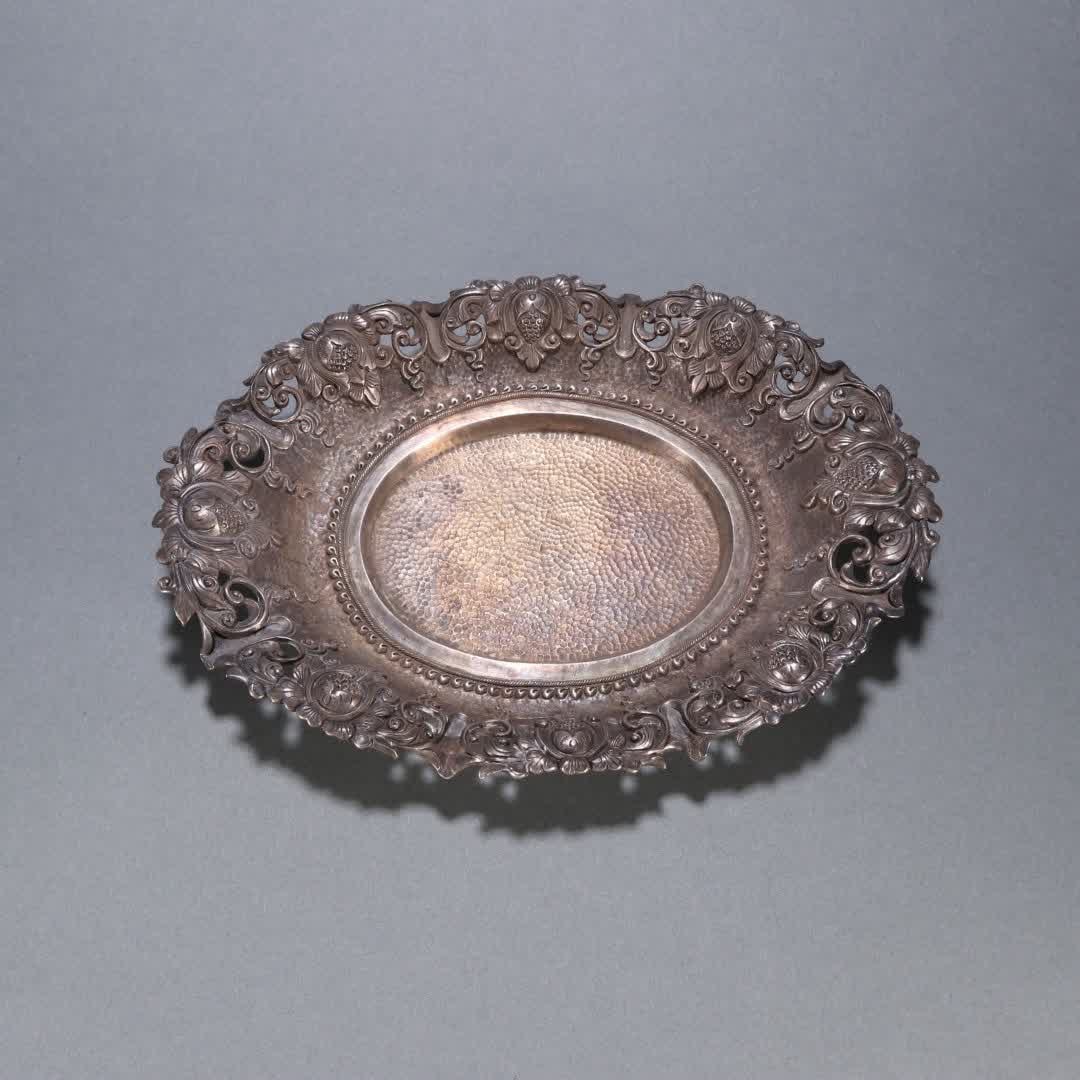 A Liao Dynasty sterling silver pattern plate (1 of 9)