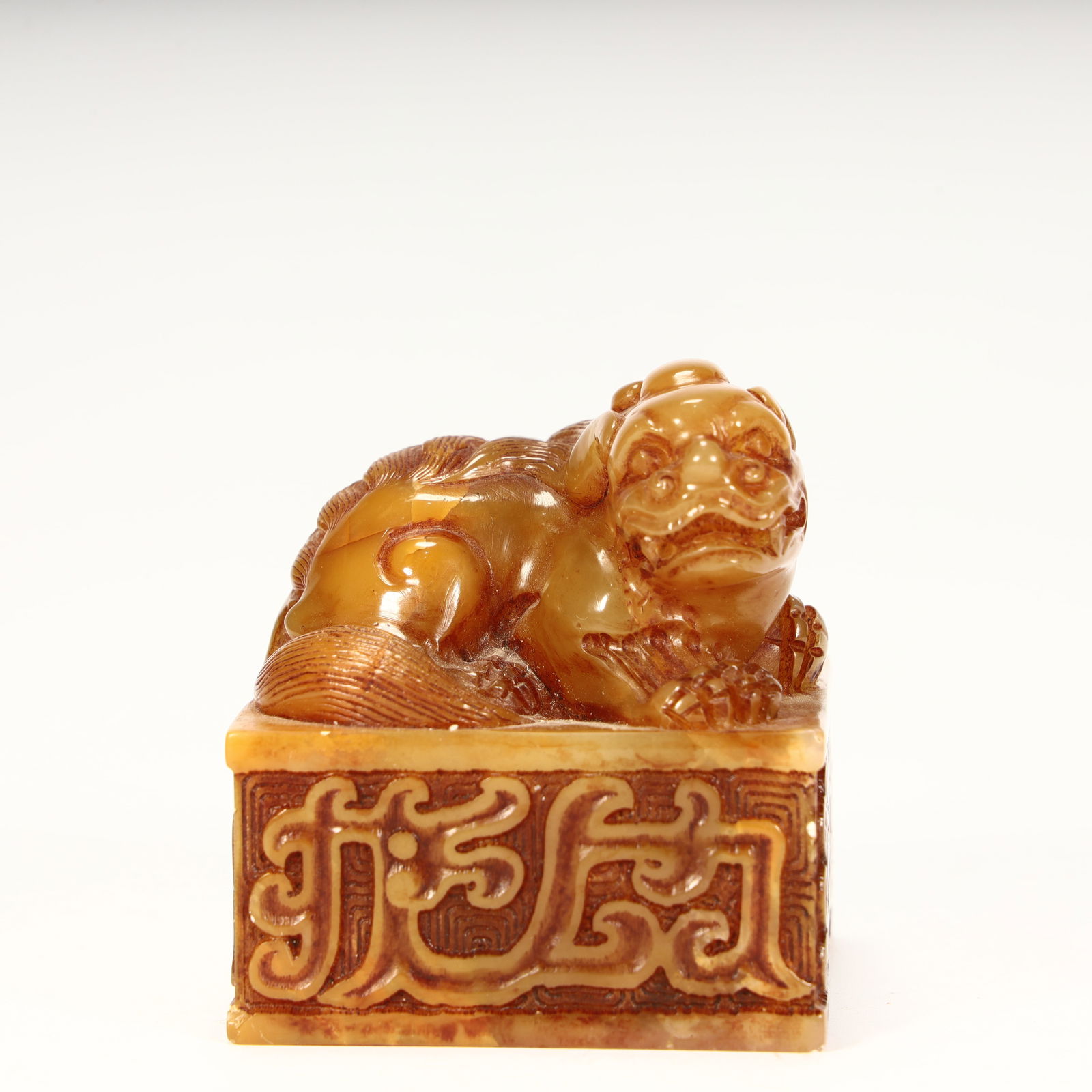 A Qing Dynasty Shoushan stone auspicious beast (Pixiu) button seal (1 of 9)