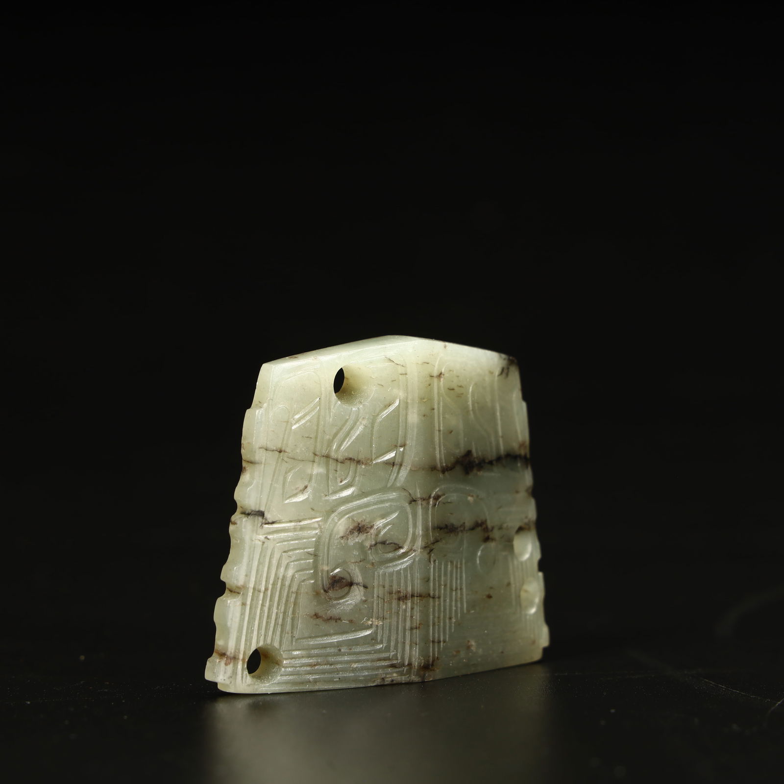 A jade relative with a beast face pattern - 2