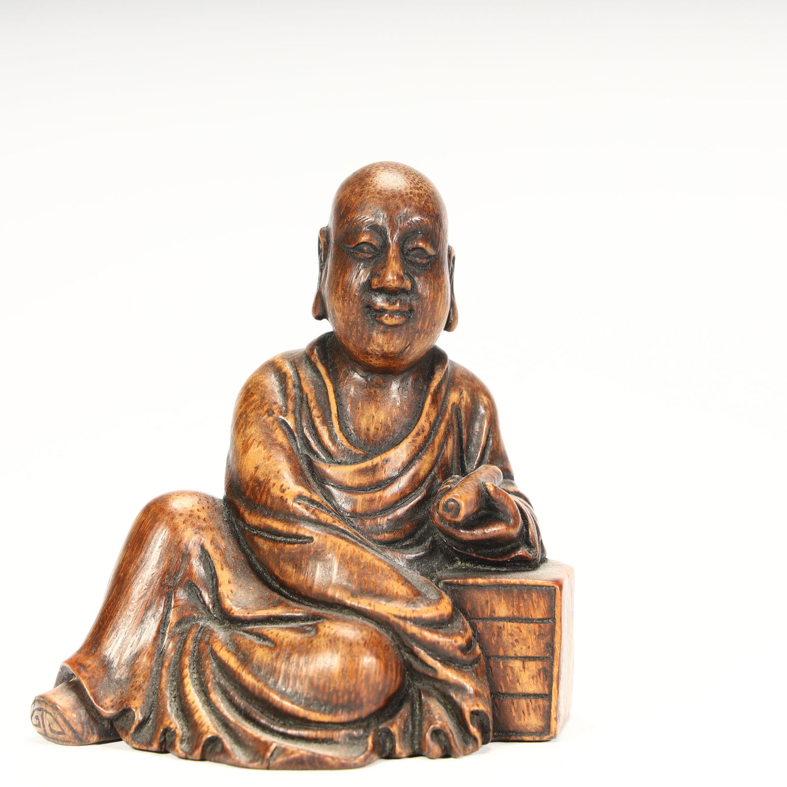 A seated statue of a bamboo carved Arhat in the Qing Dynasty (1 of 8)