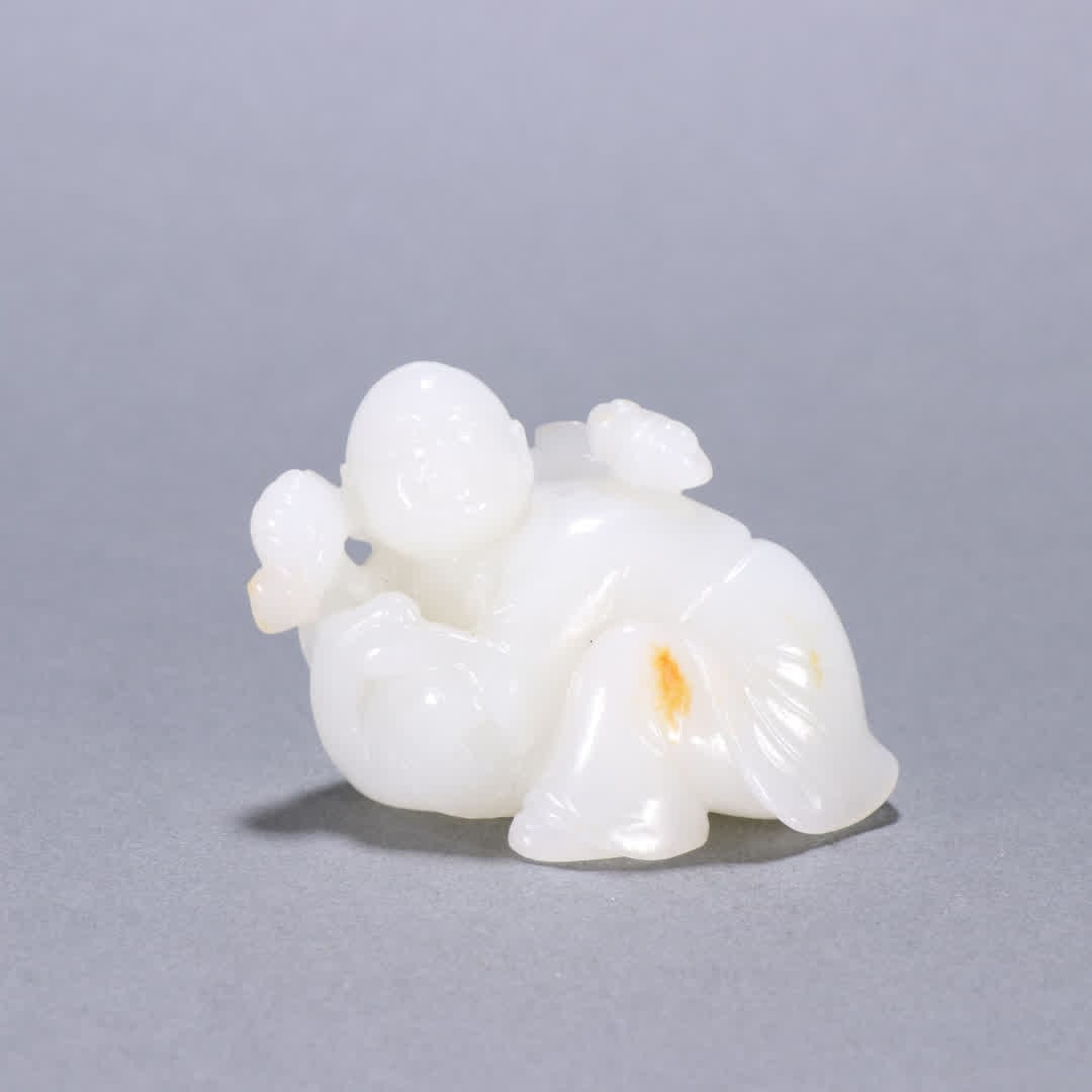 A Qing Dynasty Hetian jade boy carving (1 of 9)