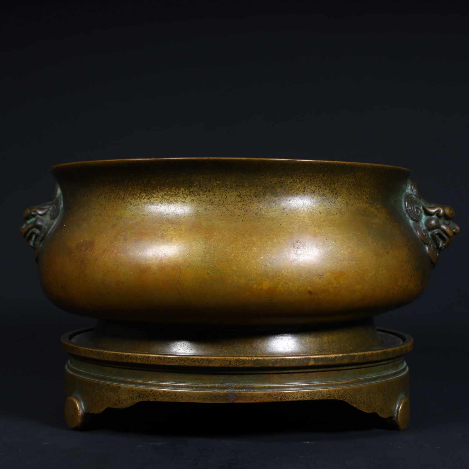 A Qing Dynasty copper animal ear strap incense burner (1 of 11)