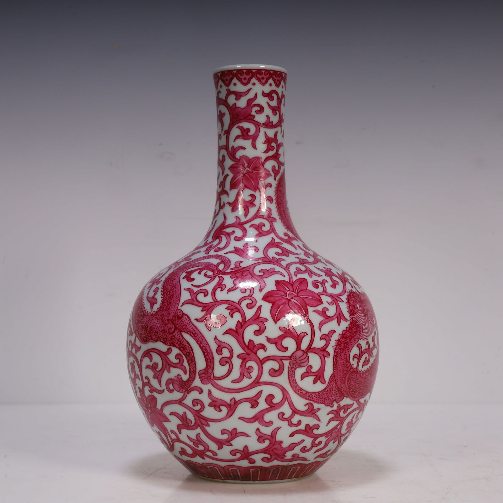 A Qing Dynasty carmine red dragon pattern heavenly ball bottle (1 of 9)