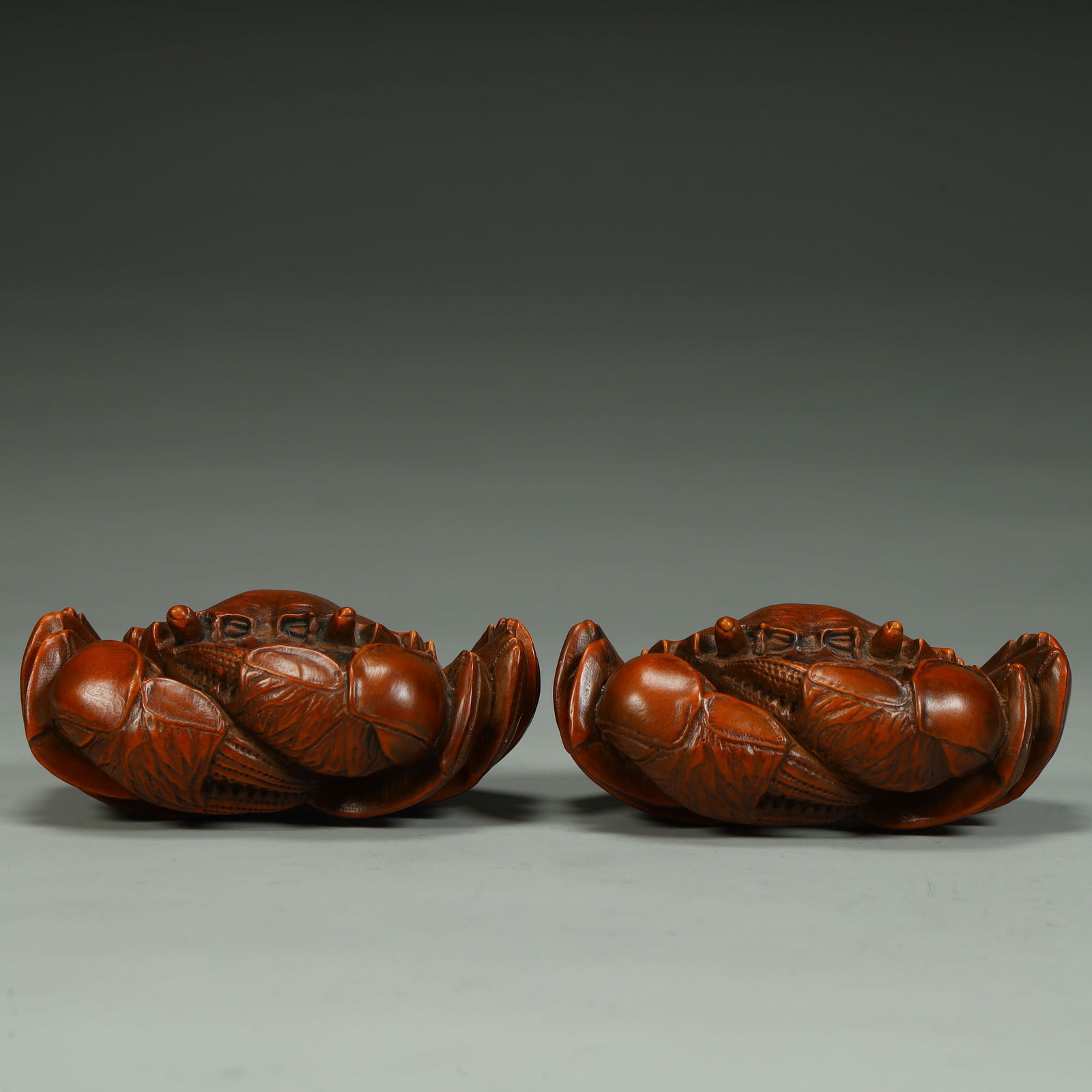 A pair of Qing Dynasty boxwood carved crab ornaments (1 of 11)