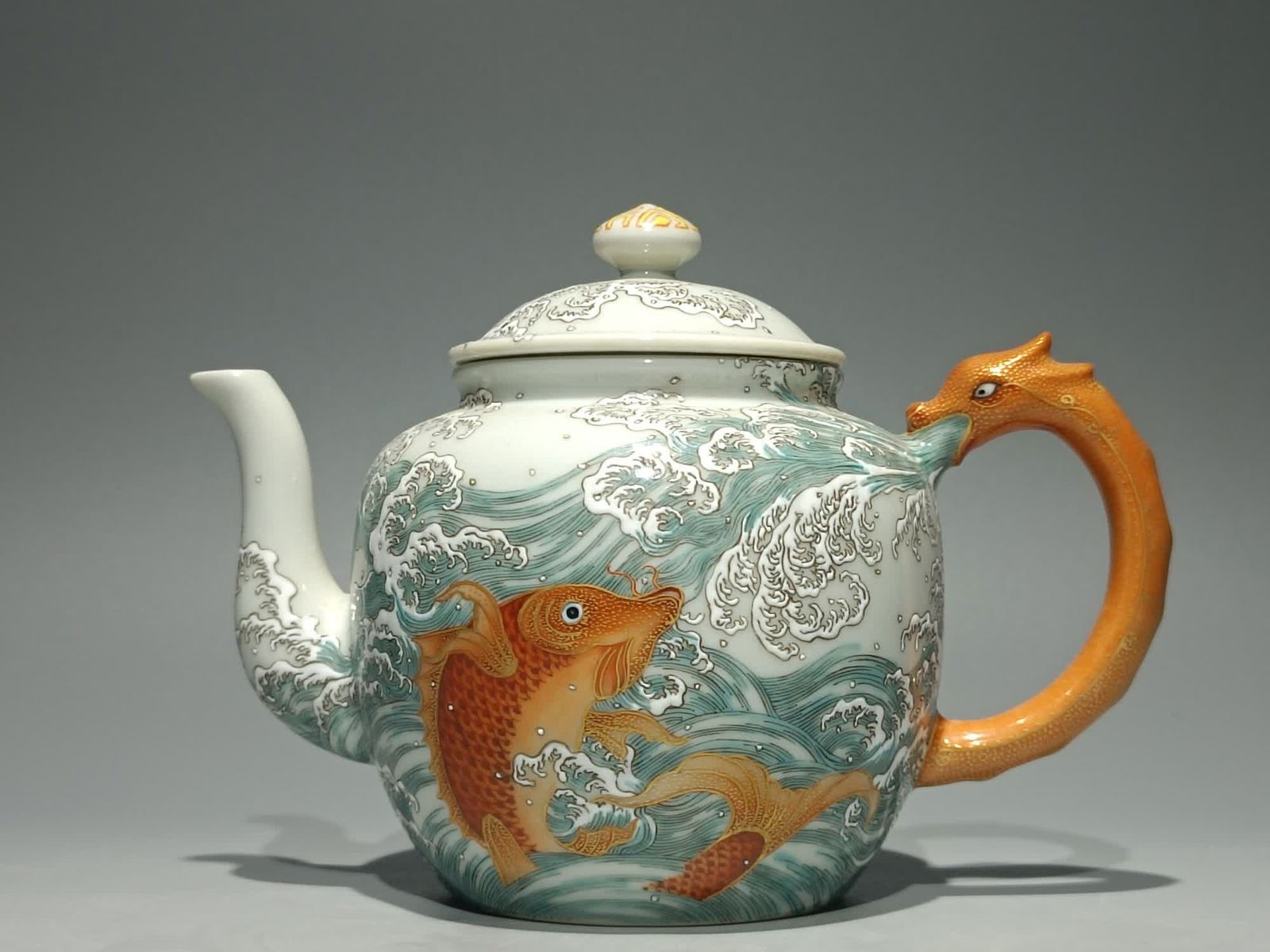 A pastel fish leaping dragon gate teapot made in the Qianlong period of the Qing Dynasty (1 of 9)